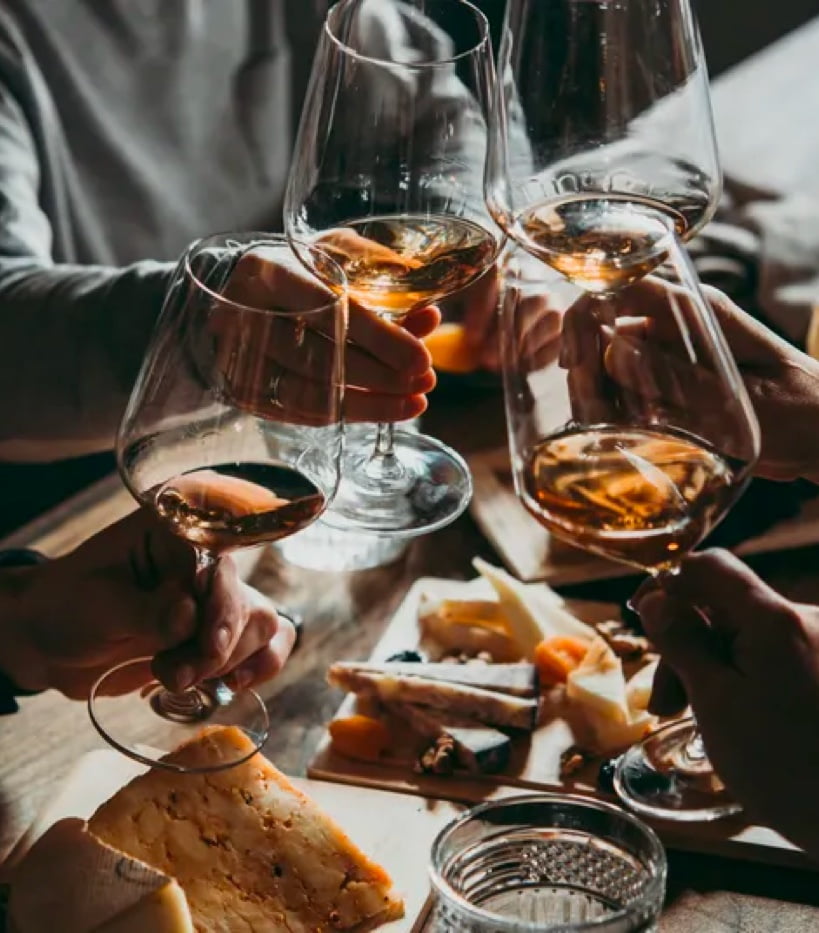 friends toasting while dining