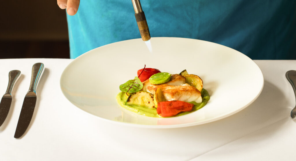 Chef plating a dish